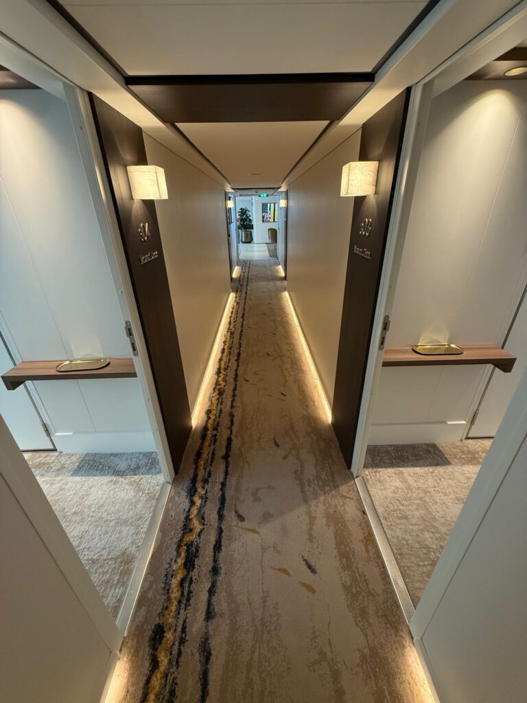 Hotel corridor and rooms with carpet